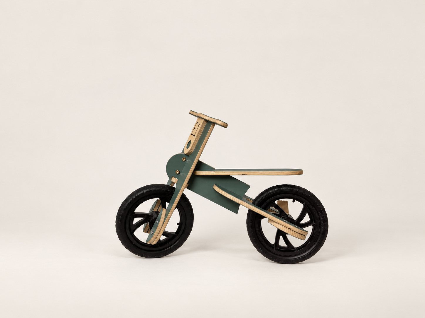 Wooden balance bike for kids, made from FSC birch plywood in Sweden