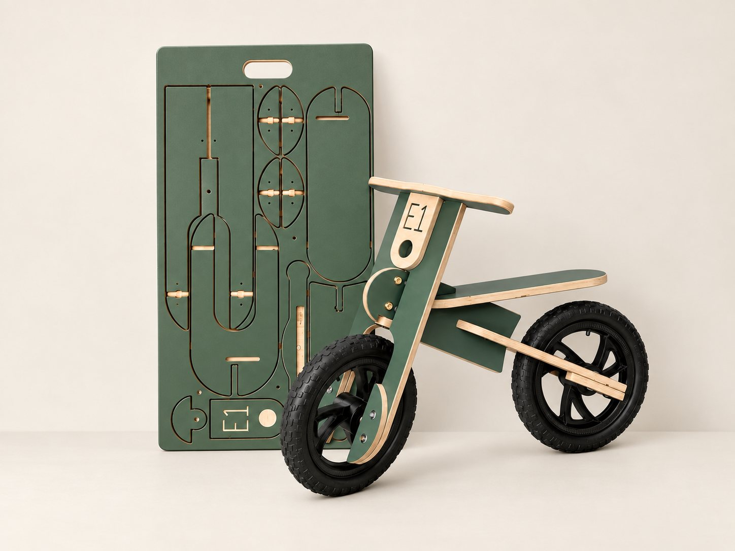Balance Bike shown flat-packed alongside the finished, assembled bike